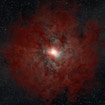 Illustration of the dust shell traveling away from a black hole and gas being pulled back towards it.